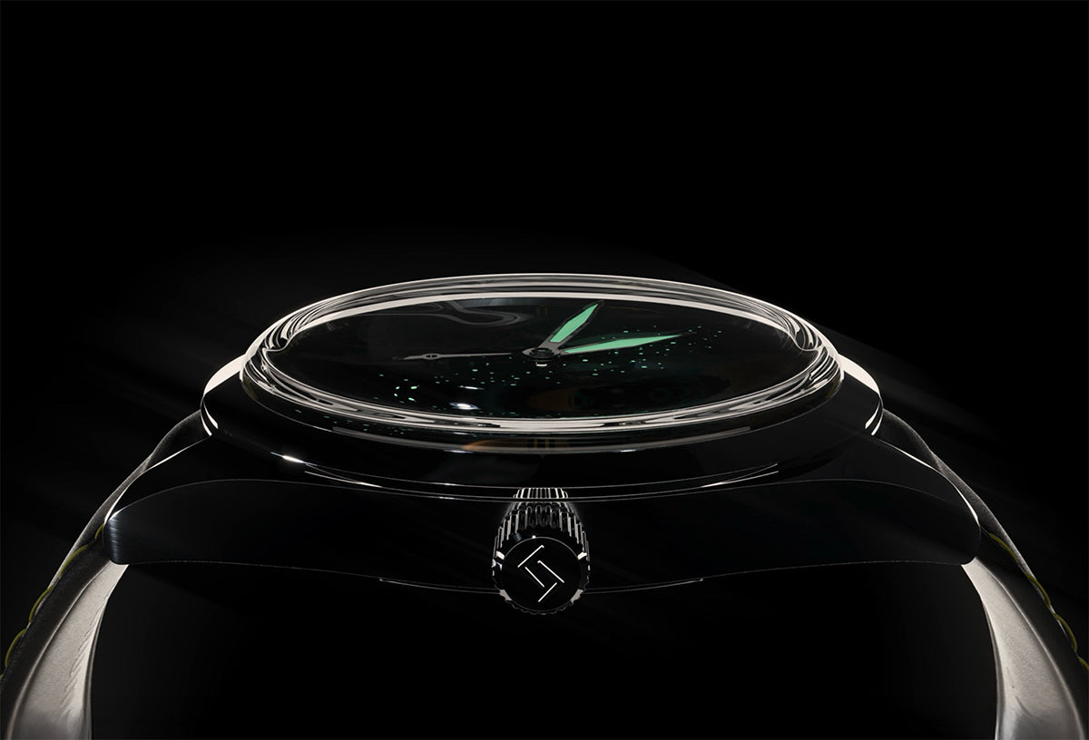 Von Doren Engwind watch with domed crystal and glowing hands in a dark setting.