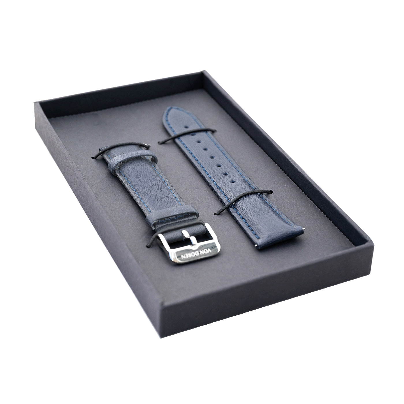 Blå Von Doren lærrem, levert i svart gaveeske med sølvspenne.