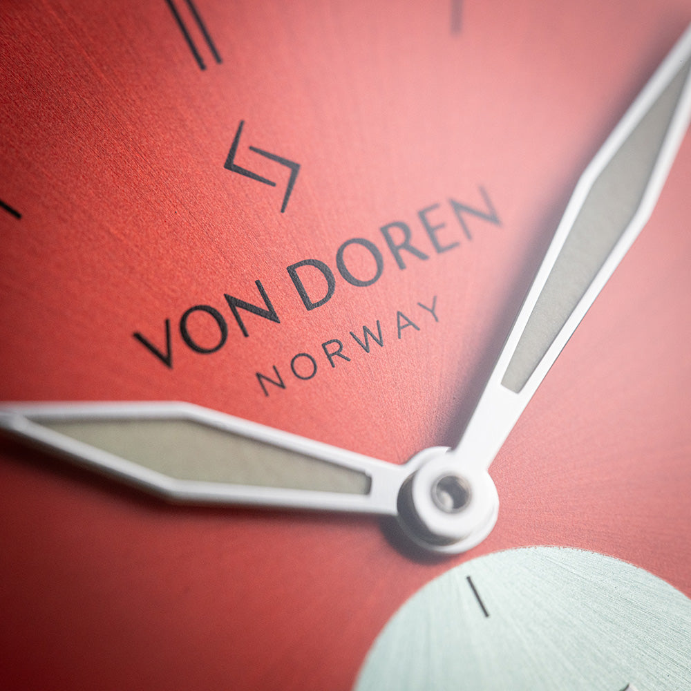 Von Doren logo på klokken Runde Chili