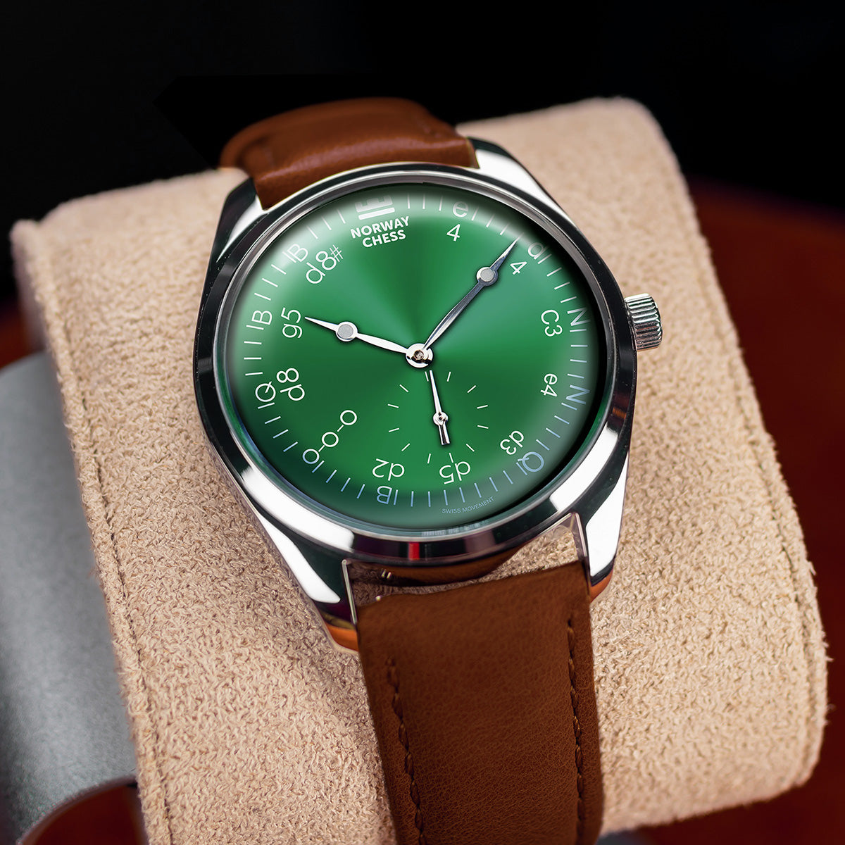 Grønn klokke med sjakktrekk som markører