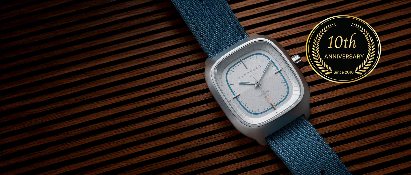 Von Doren Tanberg watch, with hvite dial and blue strap.